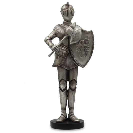 Statue of a knight in full armor holding a sword and shield on a white background